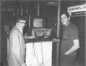Picture: Ken Charles, Astrovision Software Manager, inspects the software of Bob Weber of W&W Software, the most prolific vender of software for the Bally Arcade.